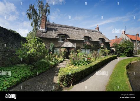 The Famous Thatched Cottage Thornton le Dale North Yorkshire Moors National Park Stock Photo - Alamy