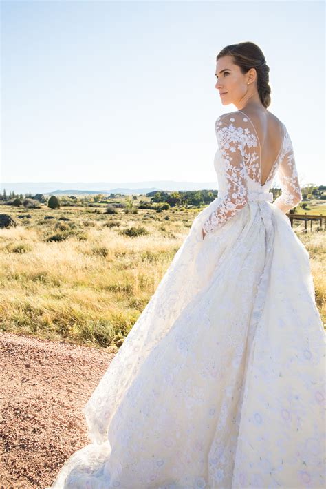 The beautiful Allison Williams in a custom Oscar de la Renta bridal gown by Peter Copping f ...