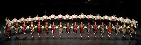 Arts:Pictured above is a Serbian dance group dancing Kolo. Kolo is a ...