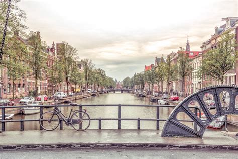 Canal Through Amsterdam City Wallpaper - Happywall