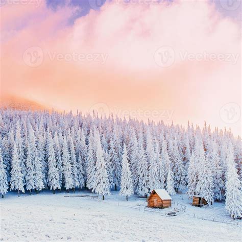 cabin in the mountains in winter 7028223 Stock Photo at Vecteezy