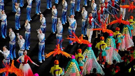 Winter Olympics opening ceremony in pictures - as skier from Uyghur ...