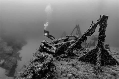 Premium Photo | Italy, mediterranean sea, diver and a sunken ship wreck ...