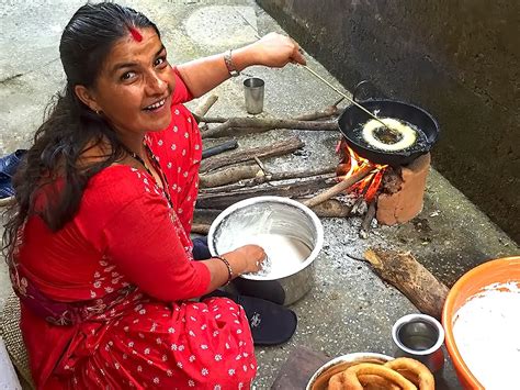 PHOTO: Making Sel Roti Rings During Tihar Holiday in Pokhara, Nepal