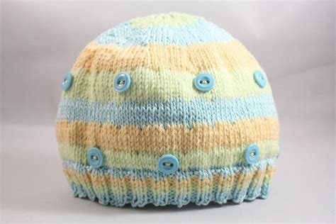 Items similar to Pastel striped knit baby hat with vintage glass ...