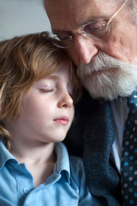 Grandfather And Grandson Sad Together by Lee Avison