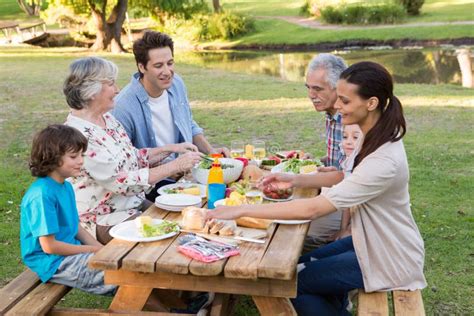 Extended Family Having an Outdoor Lunch Stock Photo - Image of granddad ...