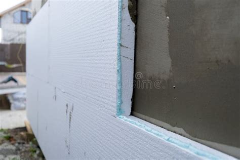 Installation of Styrofoam Insulation Sheets on House Facade Wall for ...