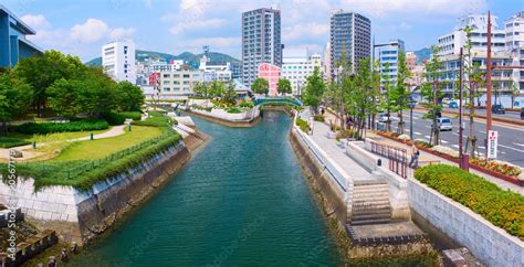 Downtown of Nagasaki city with city quay and canal river. Nagasaki City ...