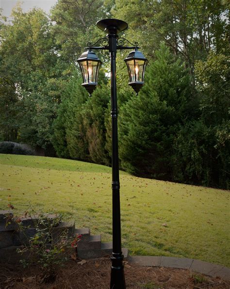 This elegant and sophisticated outdoor solar powered lamp post is sure to improve your curb ...