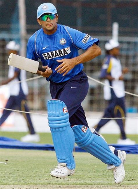 Rahul Dravid takes off for a run during practice at Rajkot ...