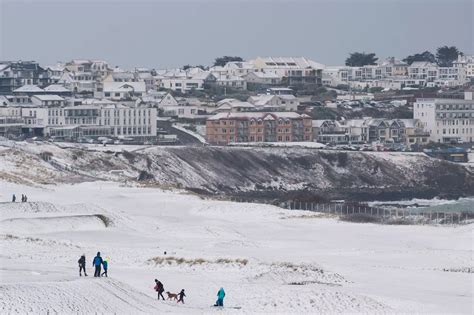 Cornwall snow in pictures as wild seas, stormy skies and crisp snow transform the county ...