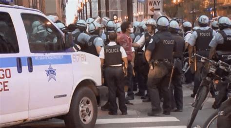 17 officers injured, 24 suspects arrested as violence erupts during protest march in Chicago ...