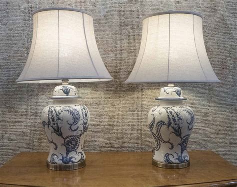 TABLE LAMPS, a pair, blue and white porcelain with shades, base 48cm H. (2)