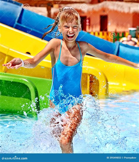 Child on Water Slide at Aquapark. Stock Image - Image of playing, recreation: 39549855