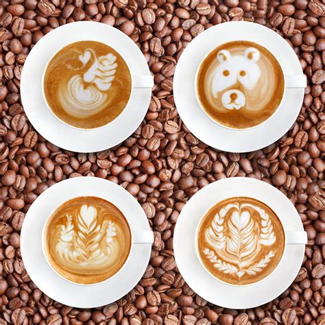 Latte art coffee on roasted coffee beans background 10435259 Stock ...