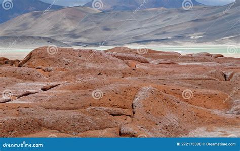 Tranquil Body of Water Seen through Red Rocks in Atacama Desert Salt ...