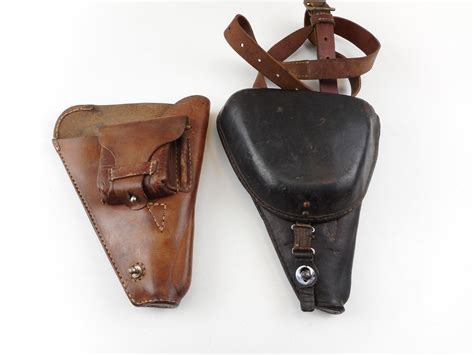 WWII NAMBU TYPE 14 HOLSTER WITH CLEANING ROD AND STRAP - Switzer's Auction & Appraisal Service