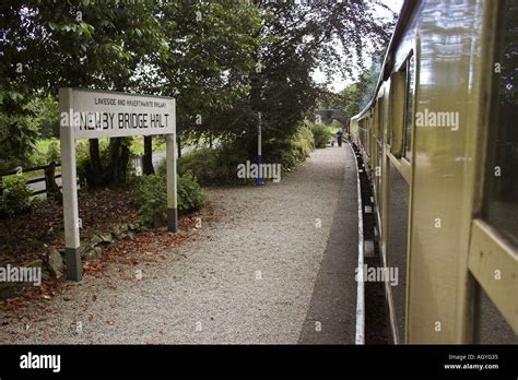 steam engine train carriages at Newby Bridge station platform on the Lakeside and Haverthwaite ...