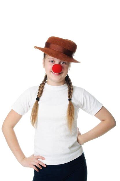 Premium Photo | Girl with red clown nose