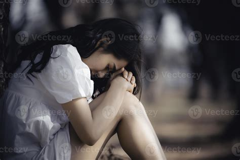 Asian beautiful girl feel alone in the forest,Sad woman concept ...