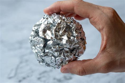 Wrinkled Ball of Aluminium Foil. Recycling Concept Stock Image - Image ...