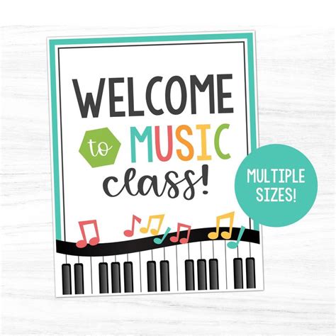 welcome to music class with musical notes on the front and back of it, next to a sign that says ...