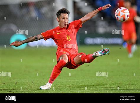 Xin Xu of China kicks at the ball during their friendly soccer match against New Zealand in ...