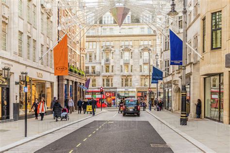 Old Bond Street in Mayfair, with its luxury stores and elegant brands, London, England, United ...