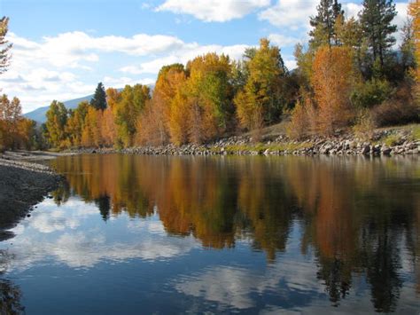 Colorful fall river reflections on my first year in Montana