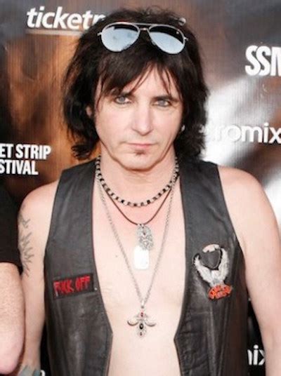 L.A. GUNS FRONTMAN, PHIL LEWIS, SAYS MÖTLEY CRÜE IS A “F–KING ATROCIOUS BAND,” AND JOKINGLY ADDS ...