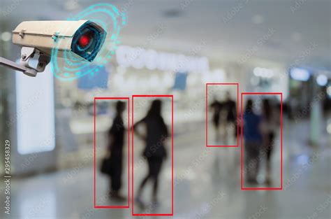 IOT CCTV, security indoor camera motion detection system operating with people shopping at ...