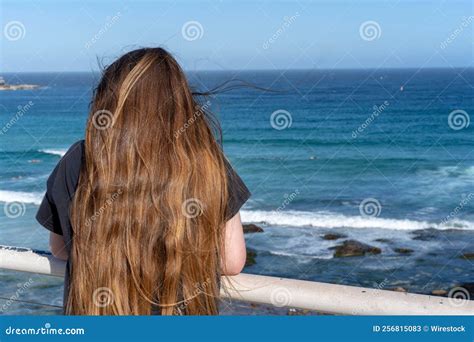 Back View of Cute Little Girl with Long Hair Watching the Sea from the Pier Stock Image - Image ...