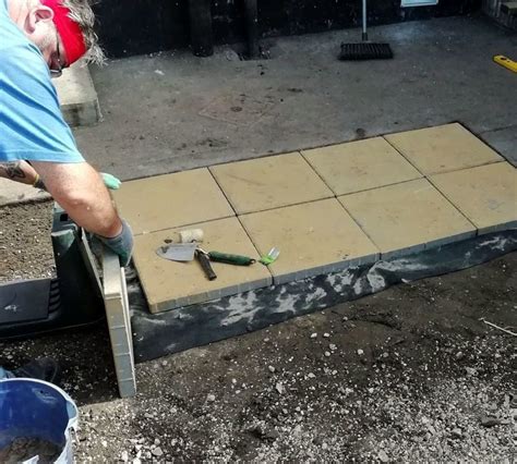 How to Build a Garden Walkway Patio by Laying Paving Slabs on Sand ...