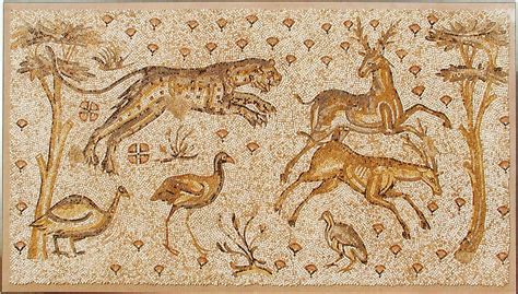 ROMAN MOSAIC WITH ANIMALS. 2nd century AD. Landscape scene with a leopard chasing two deer with ...