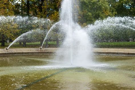 Water Spraying from Fountain. Fountain Sparkling in the City Park Day Stock Image - Image of ...