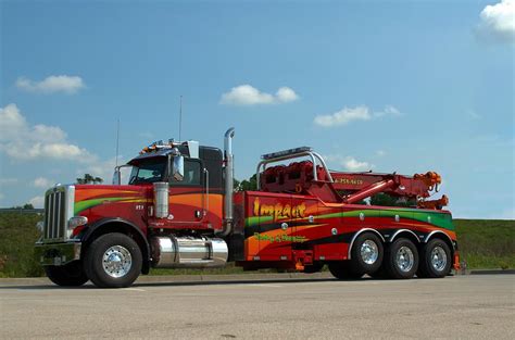 Impact Towing And Recovery Big Rig Tow Truck Photograph by Tim McCullough