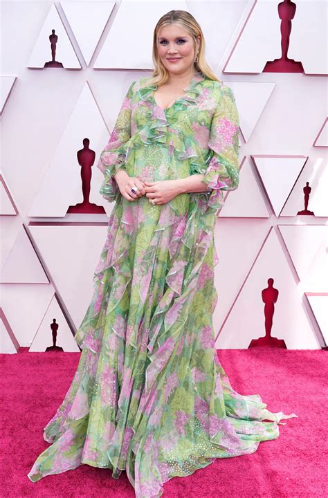 Pregnant Emerald Fennell debuts baby bump at Oscars 2021