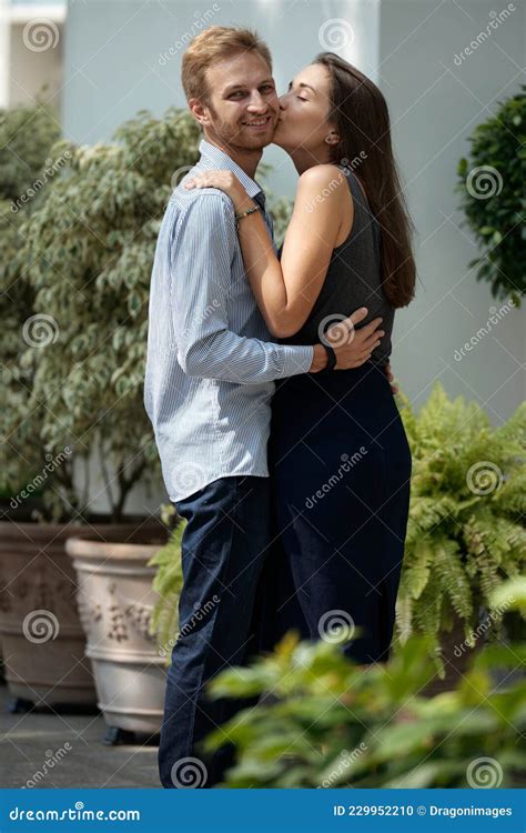 Happy Man Getting Kiss on Cheek Stock Photo - Image of family, enjoyment: 229952210