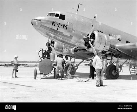 Airplane being serviced Black and White Stock Photos & Images - Alamy