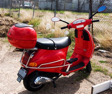 Bright red Vespa Scooter | Red vespa, Classic vespa, Vespa scooters