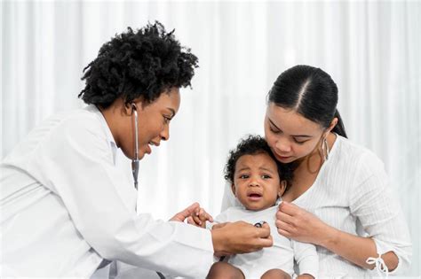 Free Stock Photo of African female pediatrician hold stethoscope to examine baby boy | Download ...