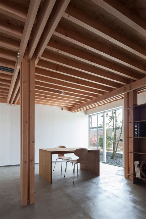 FT Architects' 4 Columns House Features A Traditional Timber Frame And ...