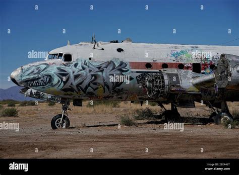 Abandoned airplanes covered in graffiti in the desert outside of ...