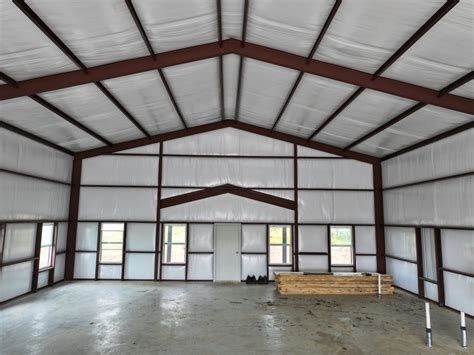 40x60 Red Iron Metal Building in Lakewood Village, Texas 75068 | WolfSteel Buildings