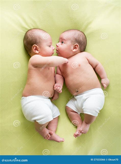 Funny Twins Brothers Babies Lying on Green Bed Stock Photo - Image of indoors, healthy: 27533366