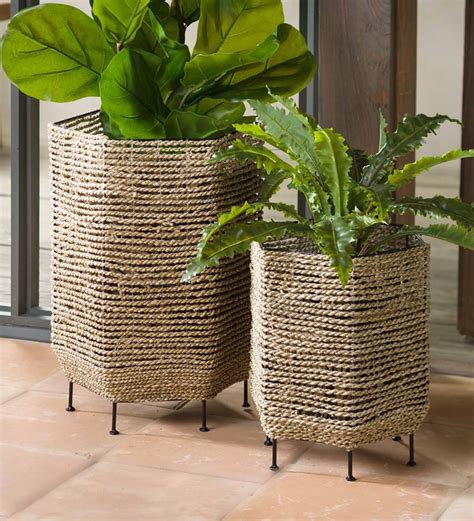 These boho-modern planters feature hand-woven seagrass with a sturdy metal stand. Even better is ...