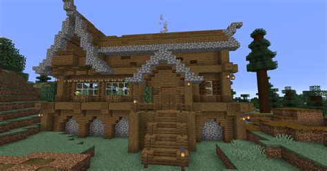 A spruce-cobblestone house I'm building. Finished the front today, feedback is welcome ...