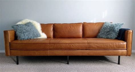 Mid-century style Axel leather sofa from West Elm | in Paddock Wood, Kent | Gumtree