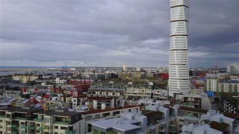 Amazing aerial view of the Malmo Western Harbour with beautiful houses and a turning Torso ...